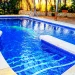 Piscina con cascada el cortijo